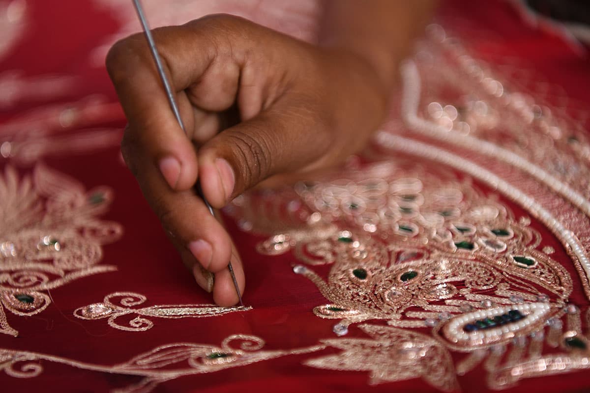 Kamran Embroidery Master Craftsman Working on Traditional Wooden Adda Frame